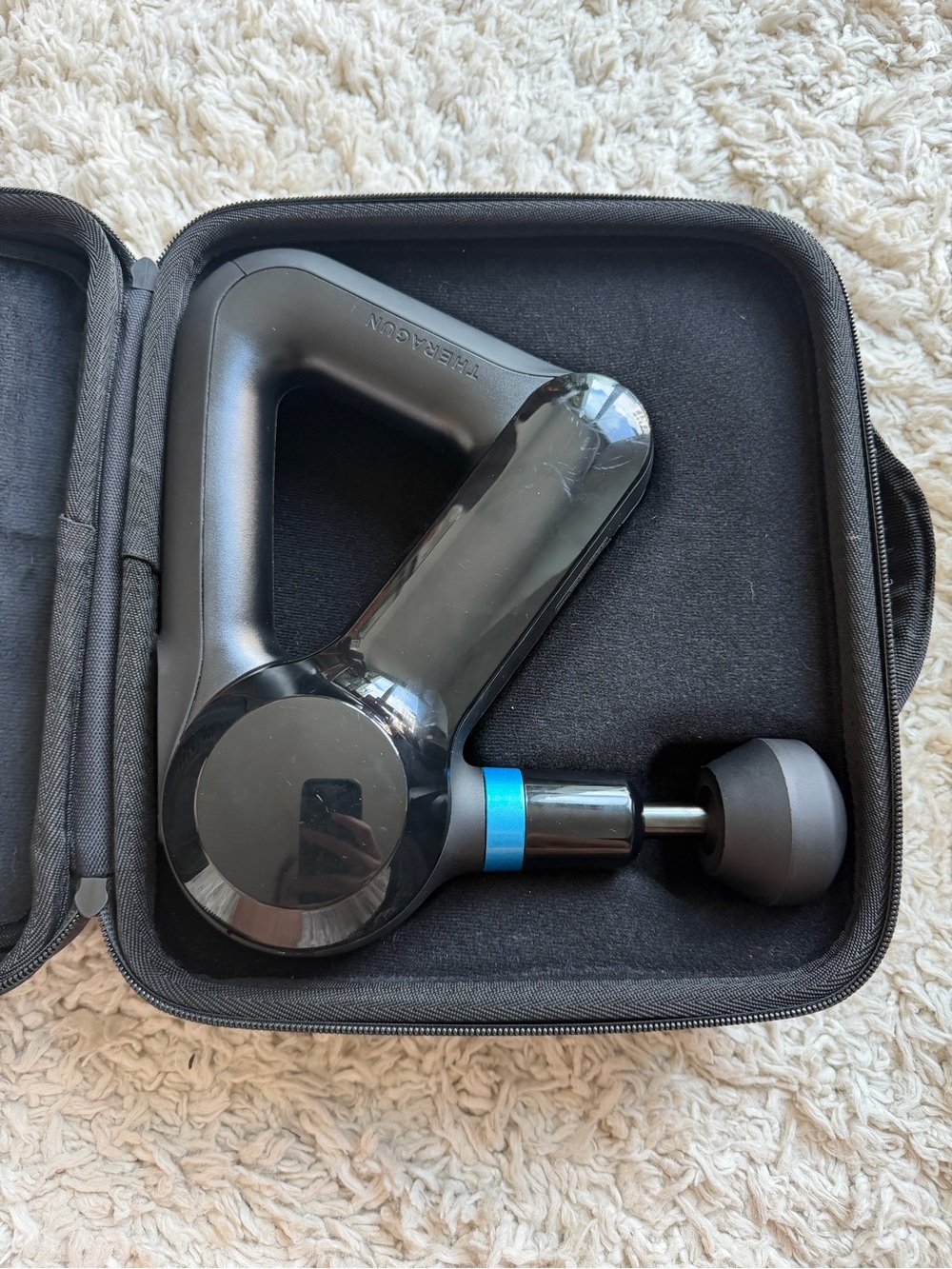 Theragun Prime Percussion Massage Gun in Black with Blue Accent